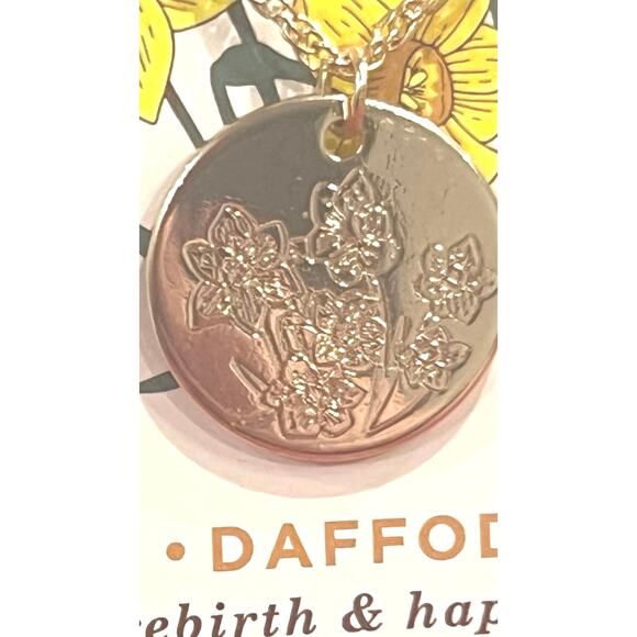 NWT - March birth flower necklace featuring a daffodil pendant on a 16" chain. - Picture 2 of 4
